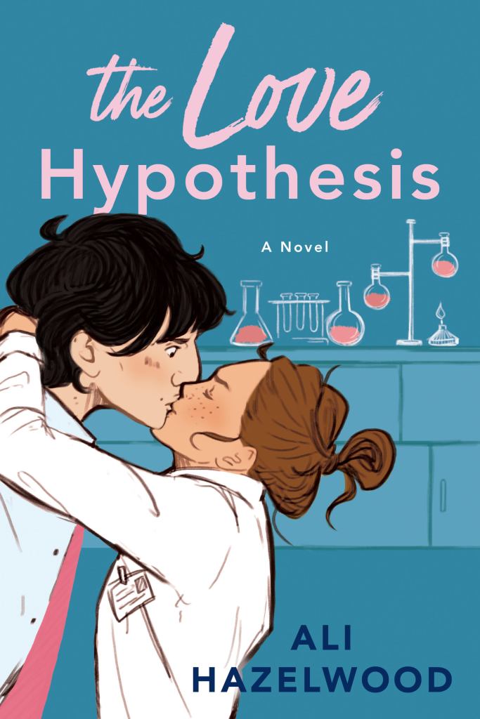 The cover image of The Love Hypothesis by Ali Hazelwood. The cover is blue and shows two people locked in a kiss, with chemistry apparatus on a worktop behind them. The couple is a dark haired man in a lab coat and pink shirt, and a woman with brown hair, also in a lab coat. The man looks surprised, his eyes are open. The woman's eyes are closed, she is clearly the instigator of the kiss.