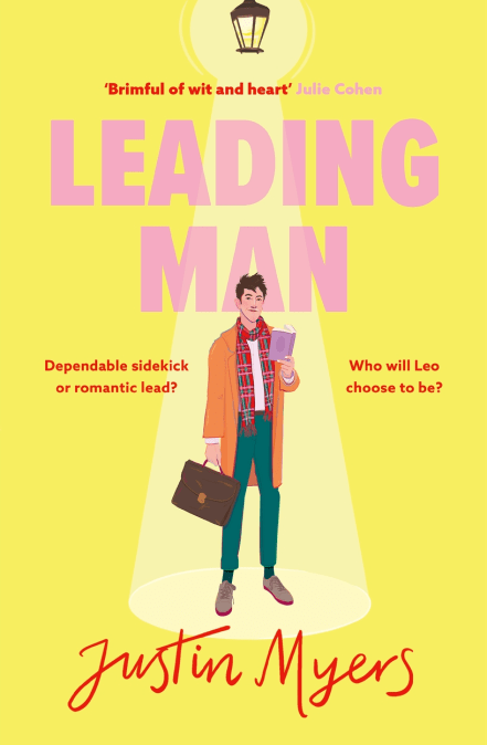 Cover image of Leading Man by Justin Myers. On a yellow background, standing beneath a spotlight, is a man. He is tall, and lanky, with thick, curling dark hair. He is white, with a slightly ruddy complexion, and wears brown-grey shoes, green trousers, a white shirt, a red tartan scarf, and an orangey-camel coloured coat. In one hand he holds a leather, flap-front briefcase, and in the other he holds a lilac book. Above the man, in a clear, bold sans serif font the title of the book [Leading Man] is written in bubblegum pink. Beneath the man, at the bottom of the page, the author's name [Justin Myers] is written in a red handwriting font.